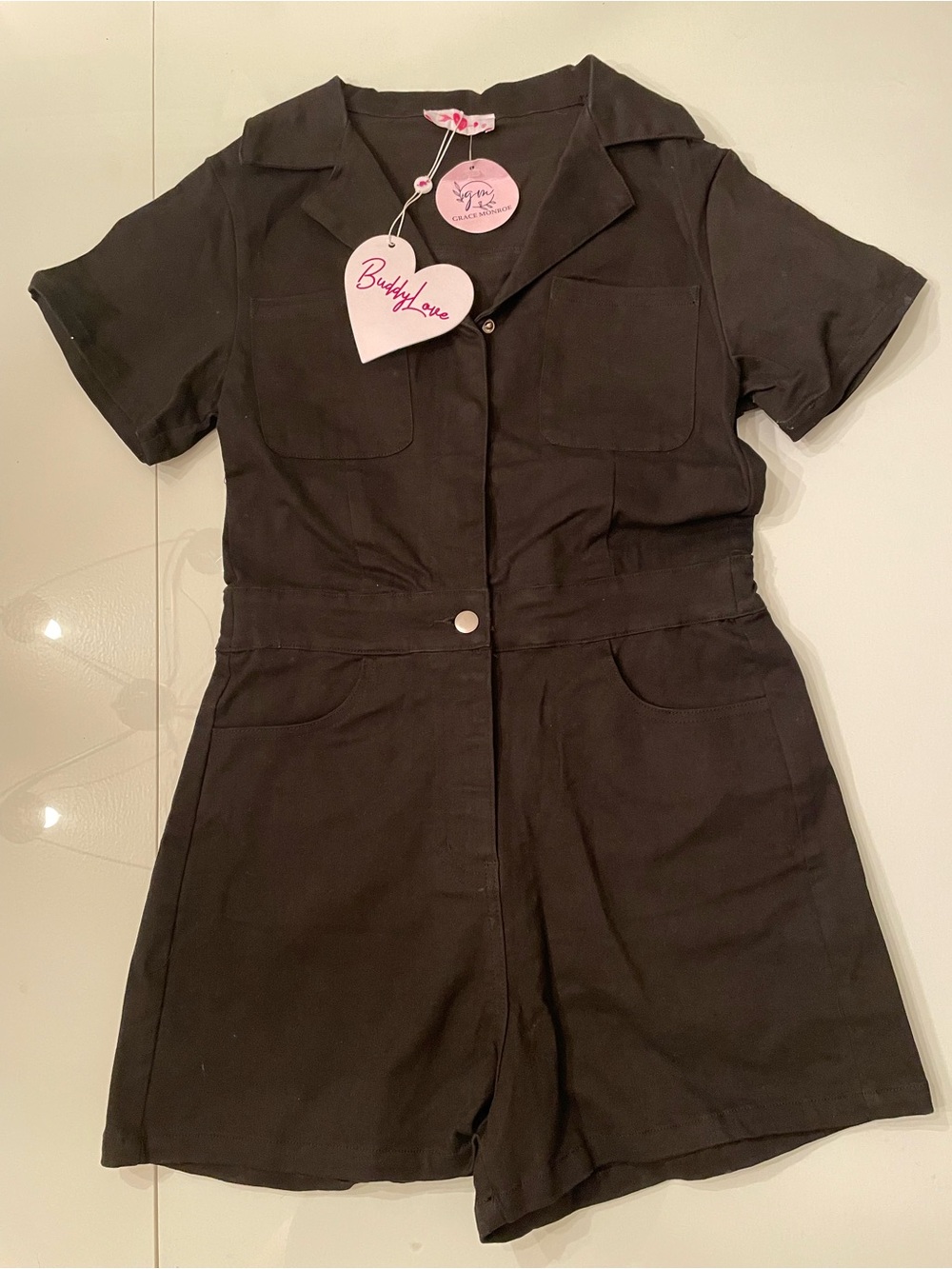 Buddy Love Black Short-Sleeve Button Romper with bling fringe on back $128 msrp